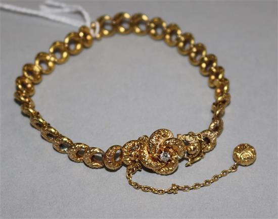 A late Victorian gold and diamond set fancy link bracelet,